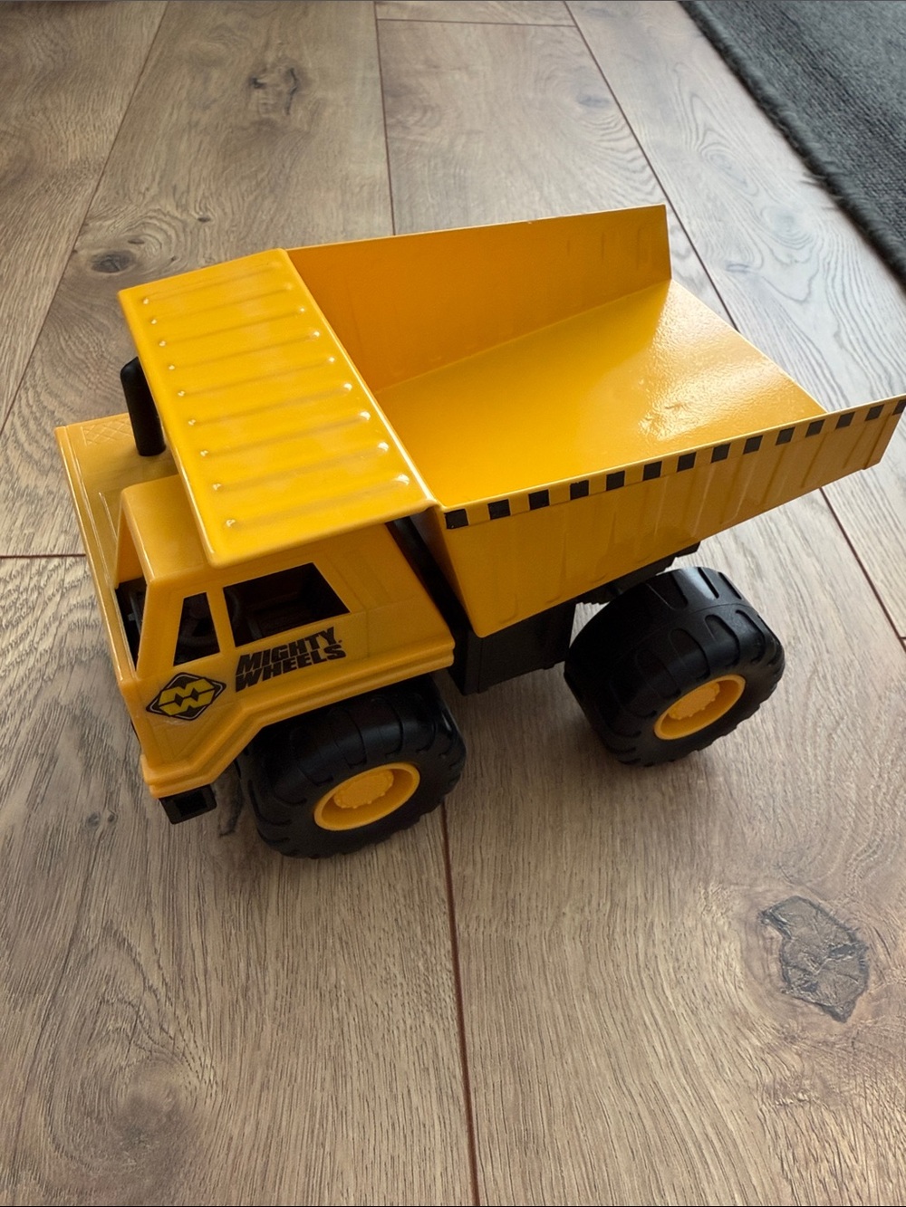 Yellow Mighty Wheels Dump Truck Toy